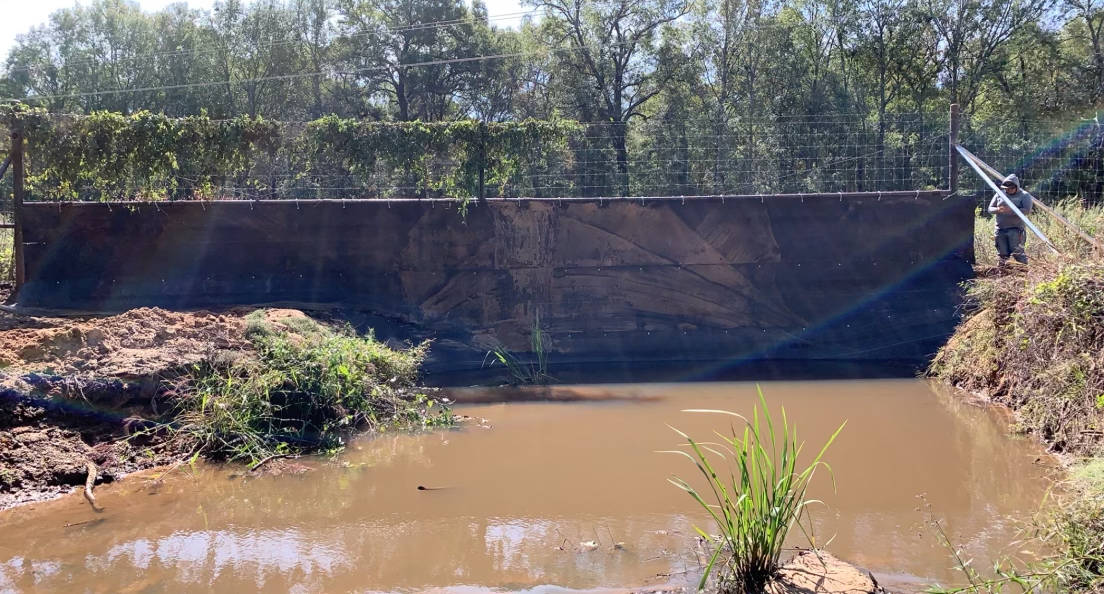 Watergap fence over a body of water